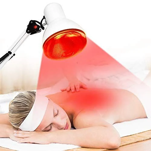 Infrared therapy lamp used during physiotherapy treatment